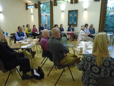 Attendees listening to a presentation