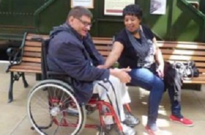 Person in wheel chair with friend